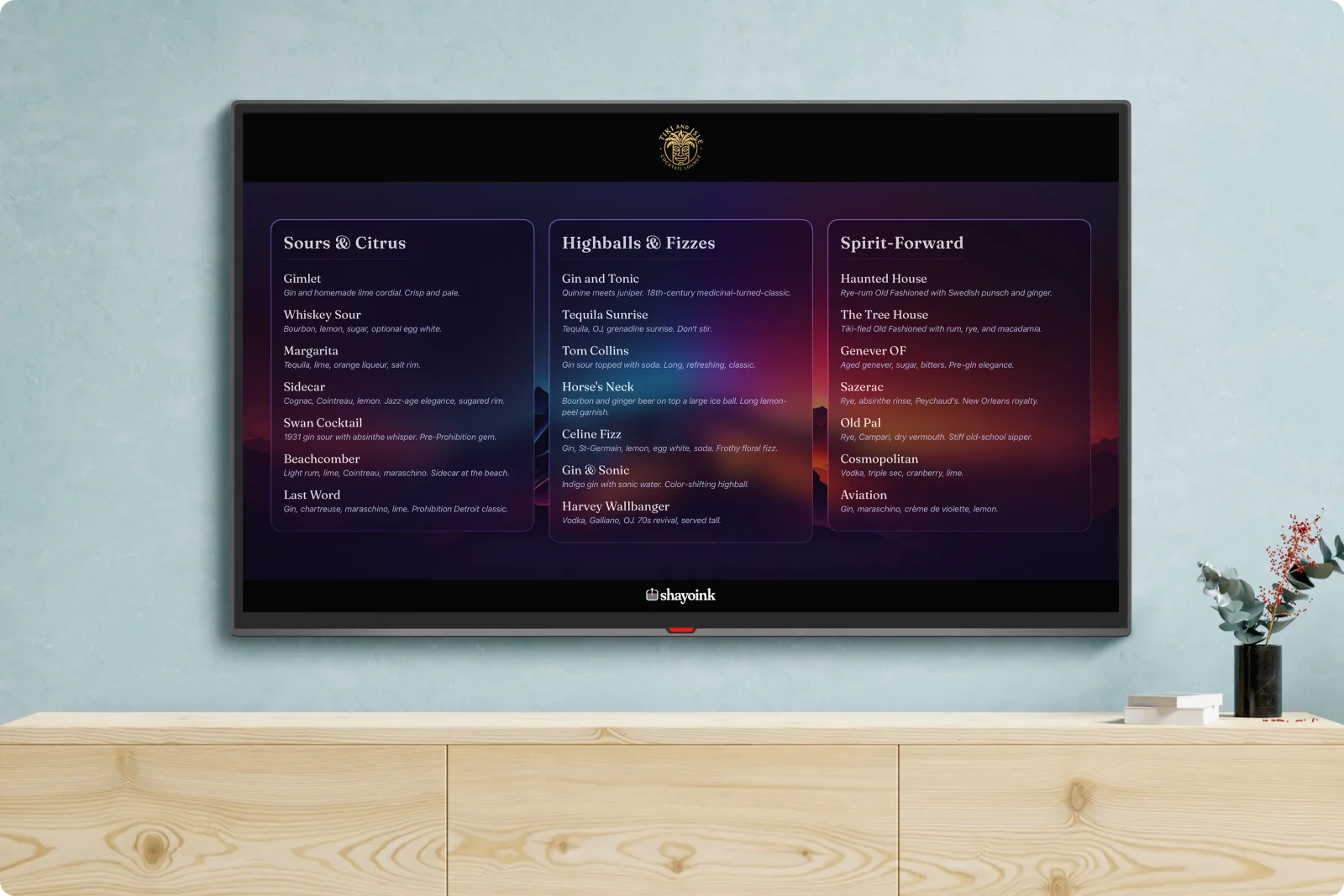 A shayoink cocktail menu on a TV display while hosting